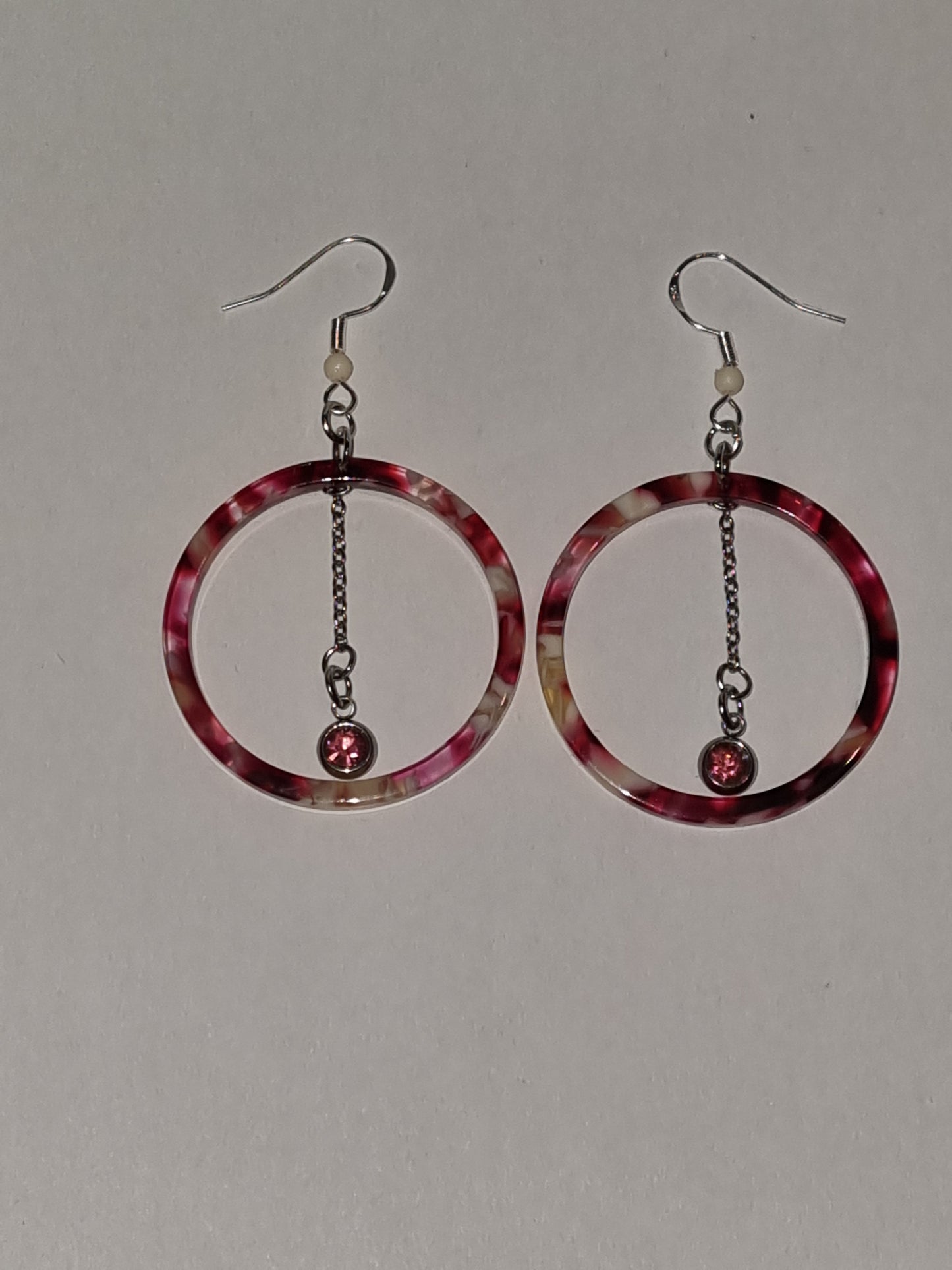 Boucles d'oreilles fantaisie rondes crochets acier inoxydable.