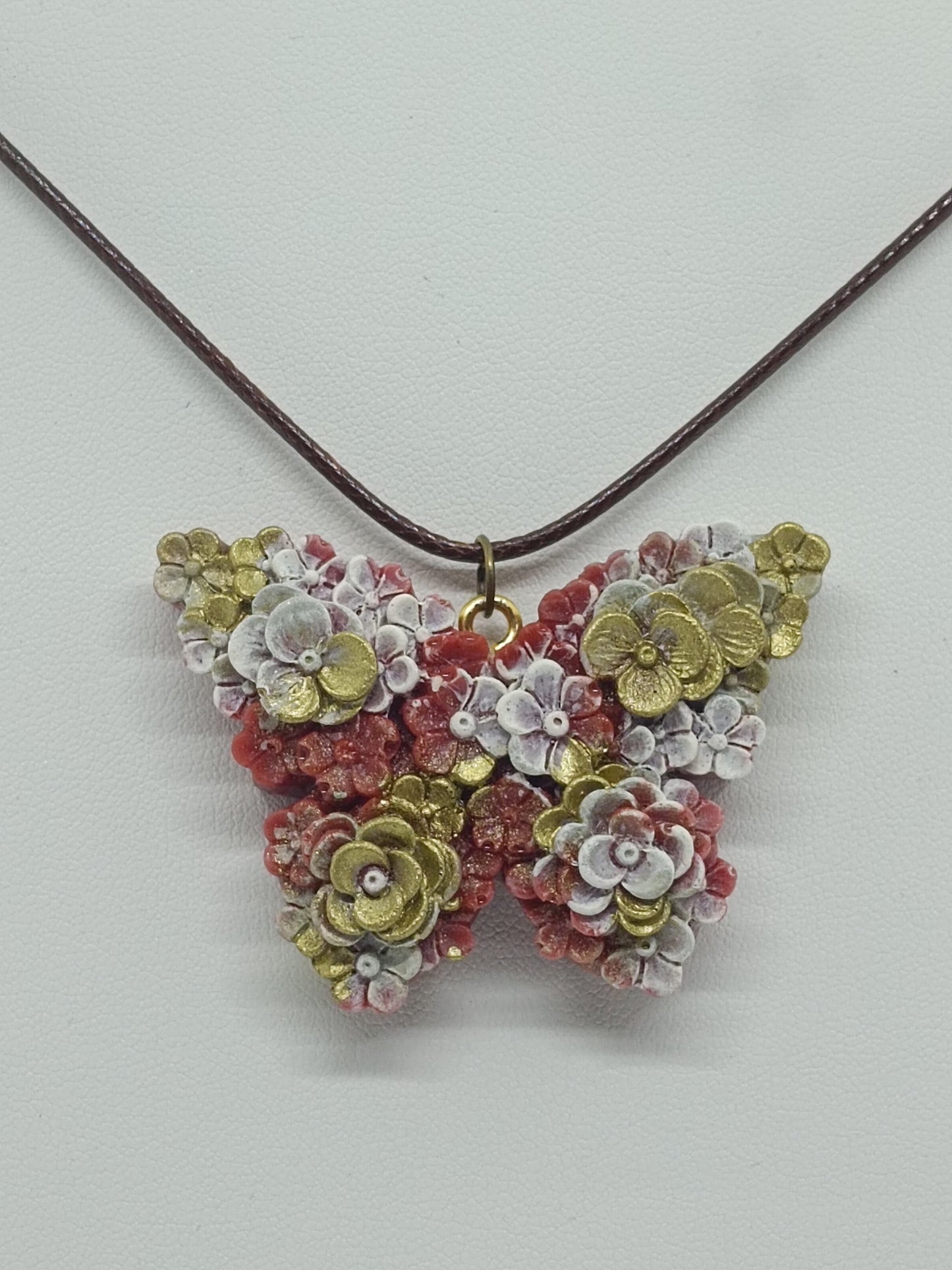 Pendentif papillon fleurs